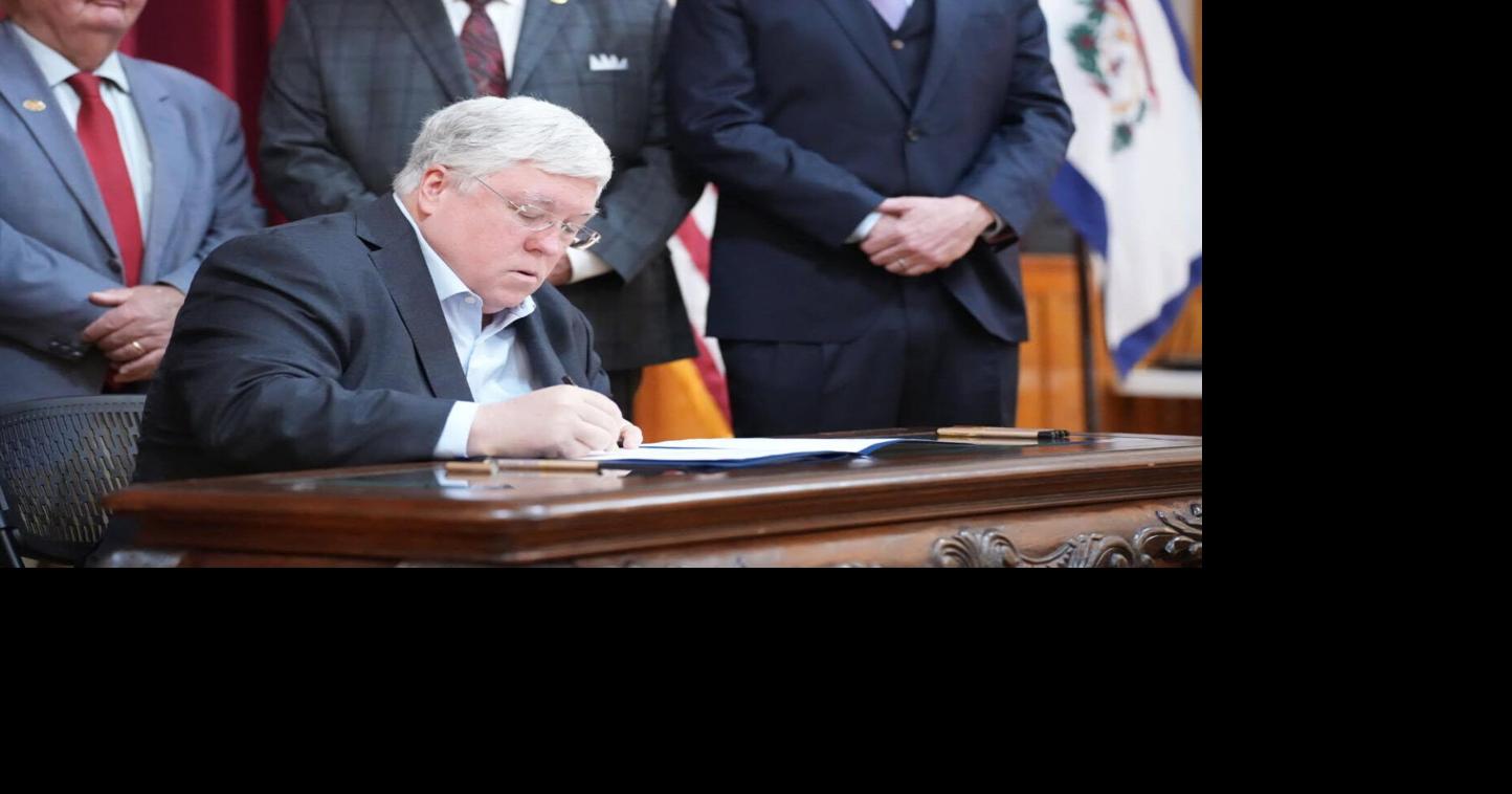 Morrisey ceremoniously signs gender affirming care bill, DEI ban
