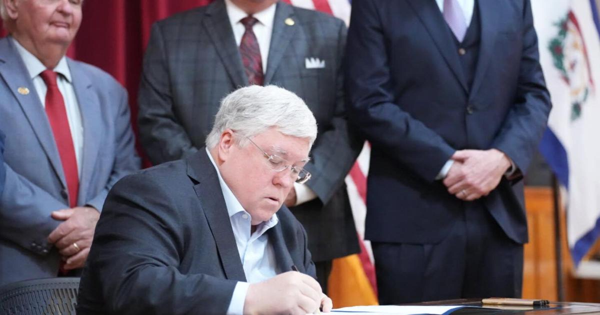 Morrisey ceremoniously signs gender affirming care bill, DEI ban