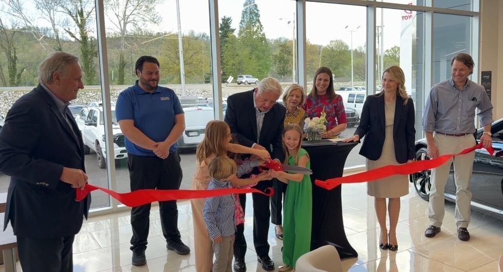 Ribbon cuttings for Moses Auto Group, Highley Blessed Realty Business
