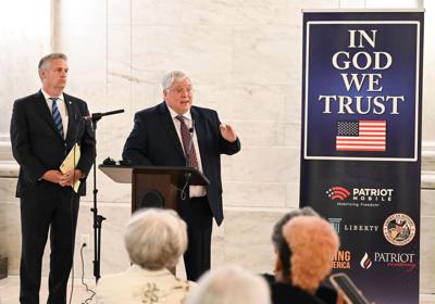"In God We Trust" news conference