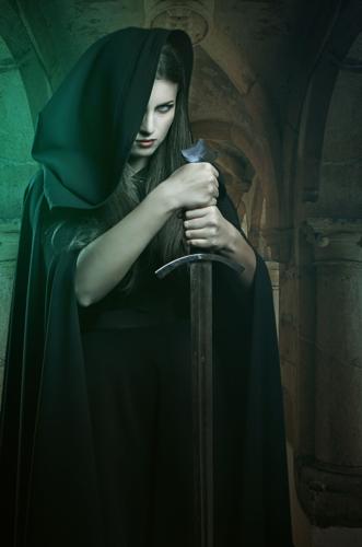 Beautiful dark woman with sword