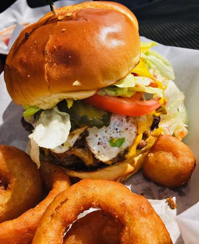 Burger and onion rings from The Bucket
