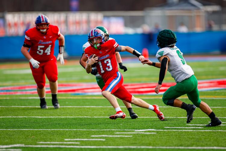 QB Peyton Grigsby calls his own number.jpg