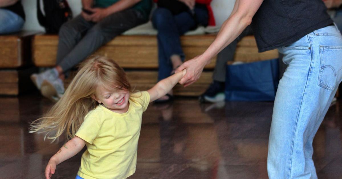 Mom and girl dancing.jpg