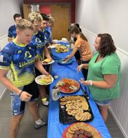 Fraternity cyclists stop in Cross Lanes during cross-country ride for disability awareness