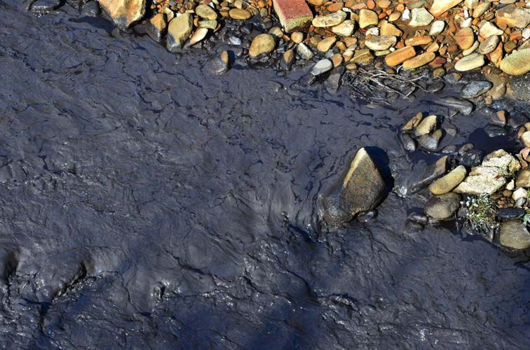 'Significant' slurry spill blackens Kanawha creek