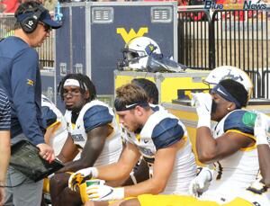 WVU to retain Neal Brown as football coach | Blue Gold News | WVU to retain Neal Brown as football coach | Blue Gold News |