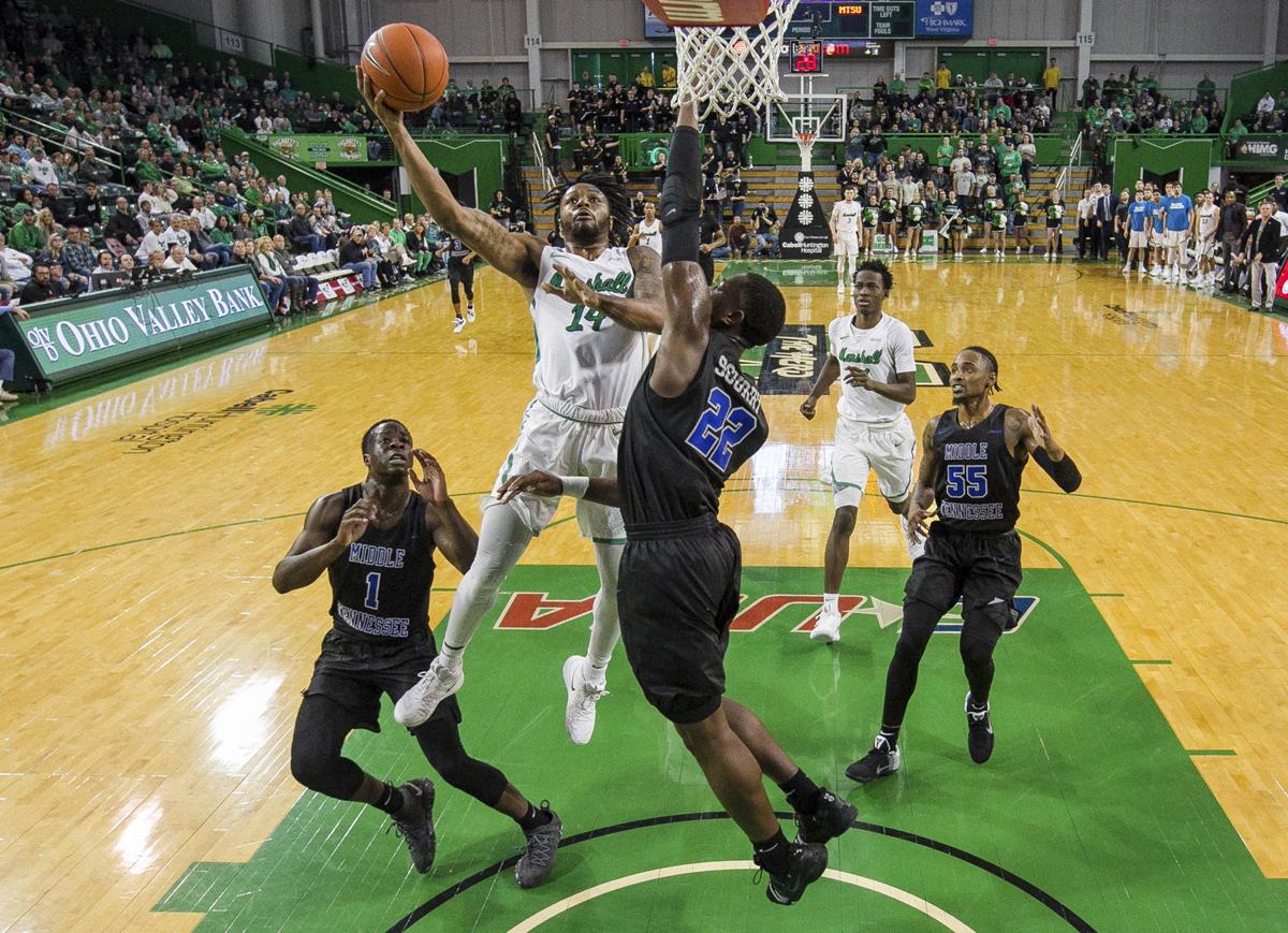 Marshall Basketball Different Vibe Helps Herd Beat Middle