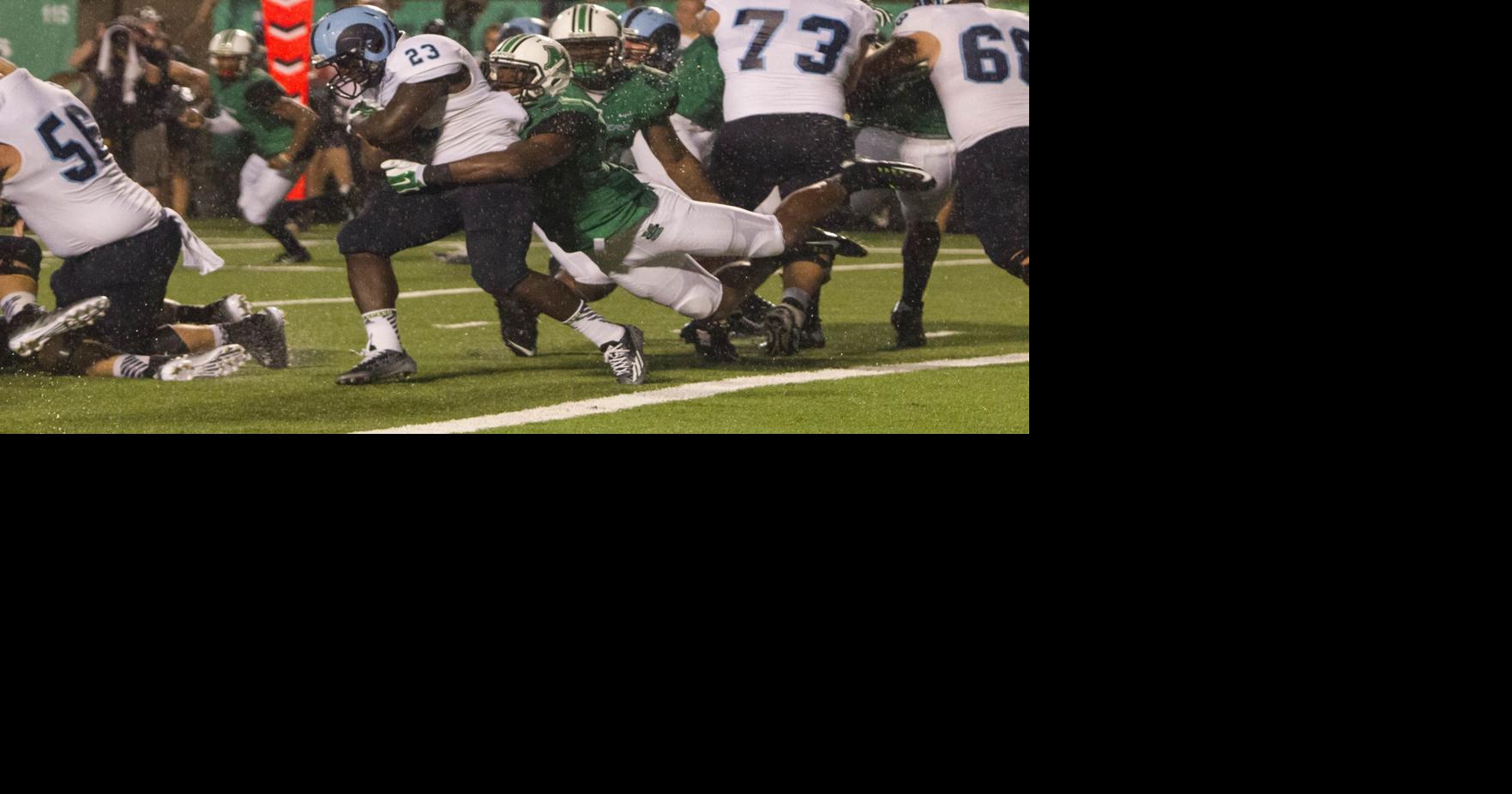 MARSHALL FOOTBALL Herd defense dominant in home opener Sports