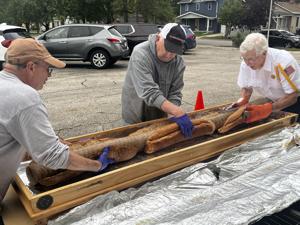 La Crosse Oktoberfest Tradition Continues With Ceremonial Golden Brat Slicing