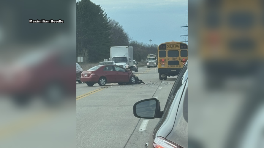 Lanes blocked after a car and school bus collide | News | wxow.com