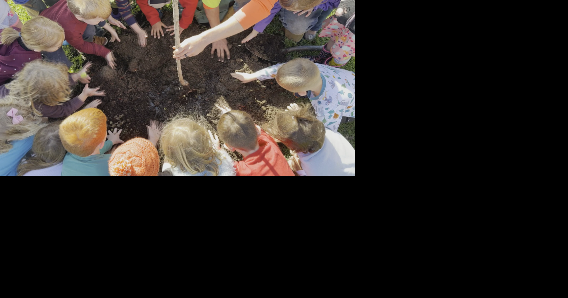 Young students get hands-on lesson in planting trees on Arbor Day ...