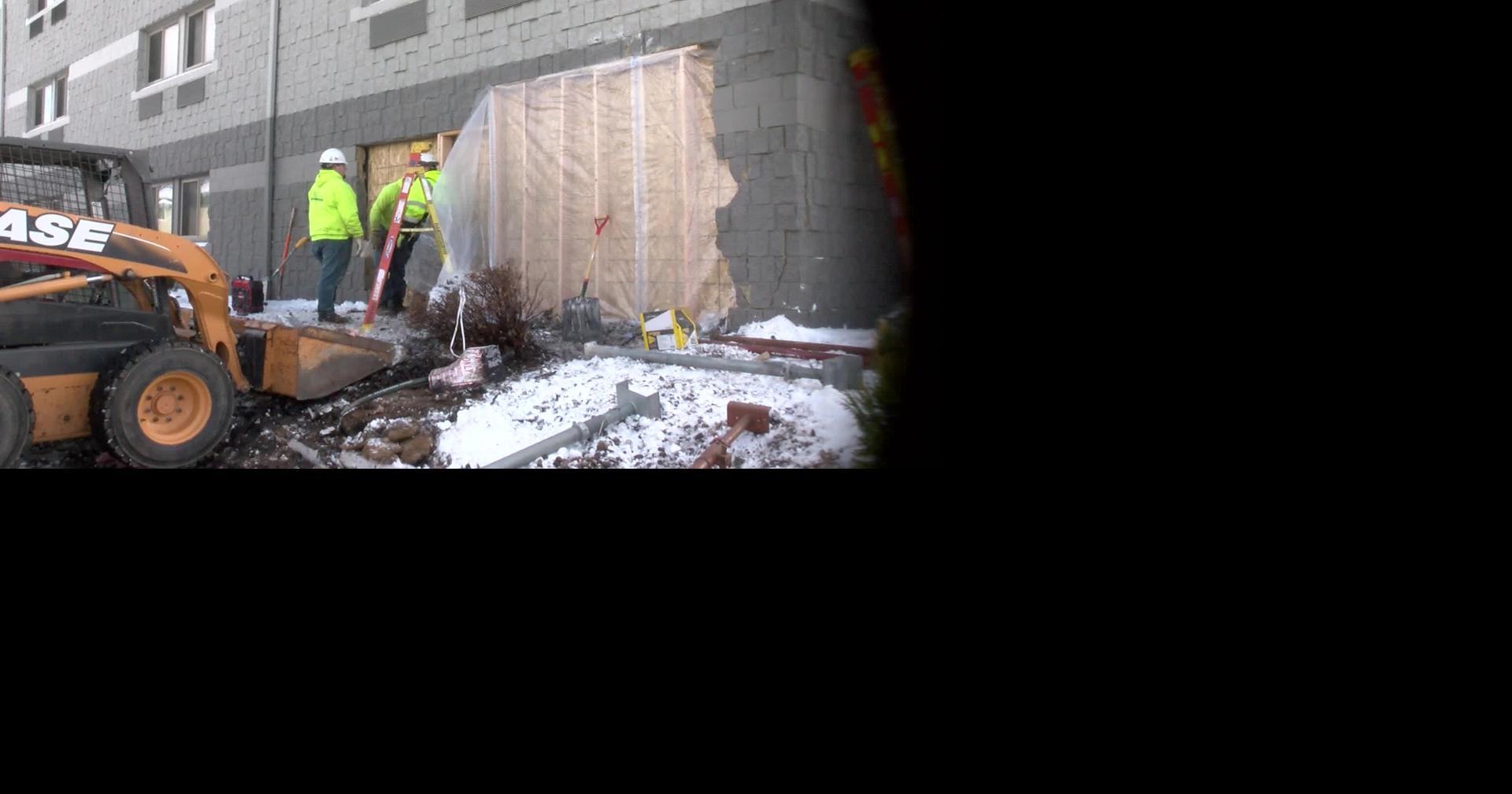 Semi crashes into La Crosse hotel