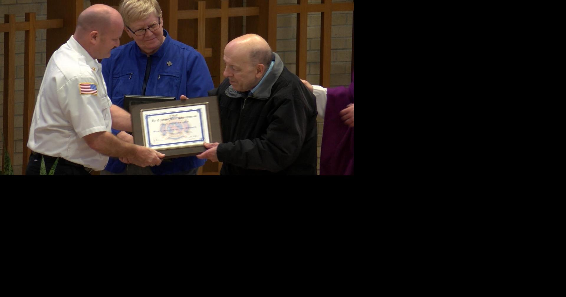 La Crosse Firefighters present Lifesaver Award to Mary Mother of the