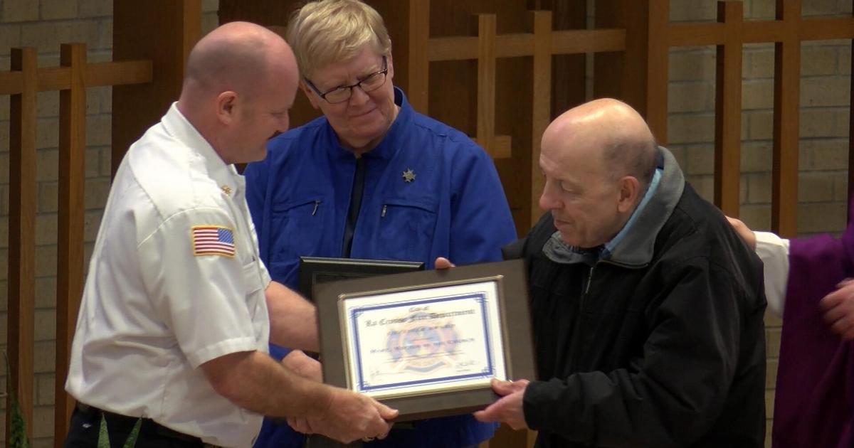 La Crosse Firefighters present Lifesaver Award to Mary Mother of the