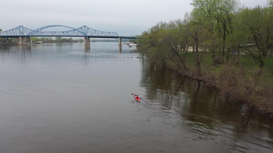 Bobbi Rathert paddling down the Mississippi River