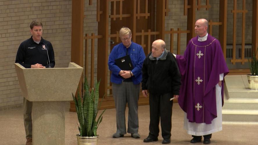 La Crosse Firefighters present Lifesaver Award to Mary Mother of the