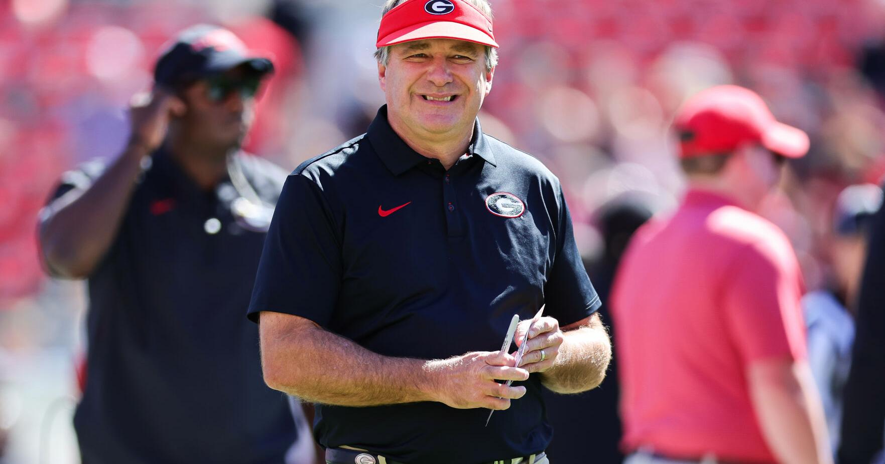 Georgia - Alabama showdown is on schedule despite arrival of Hurricane Isaias ; Trump will skip game