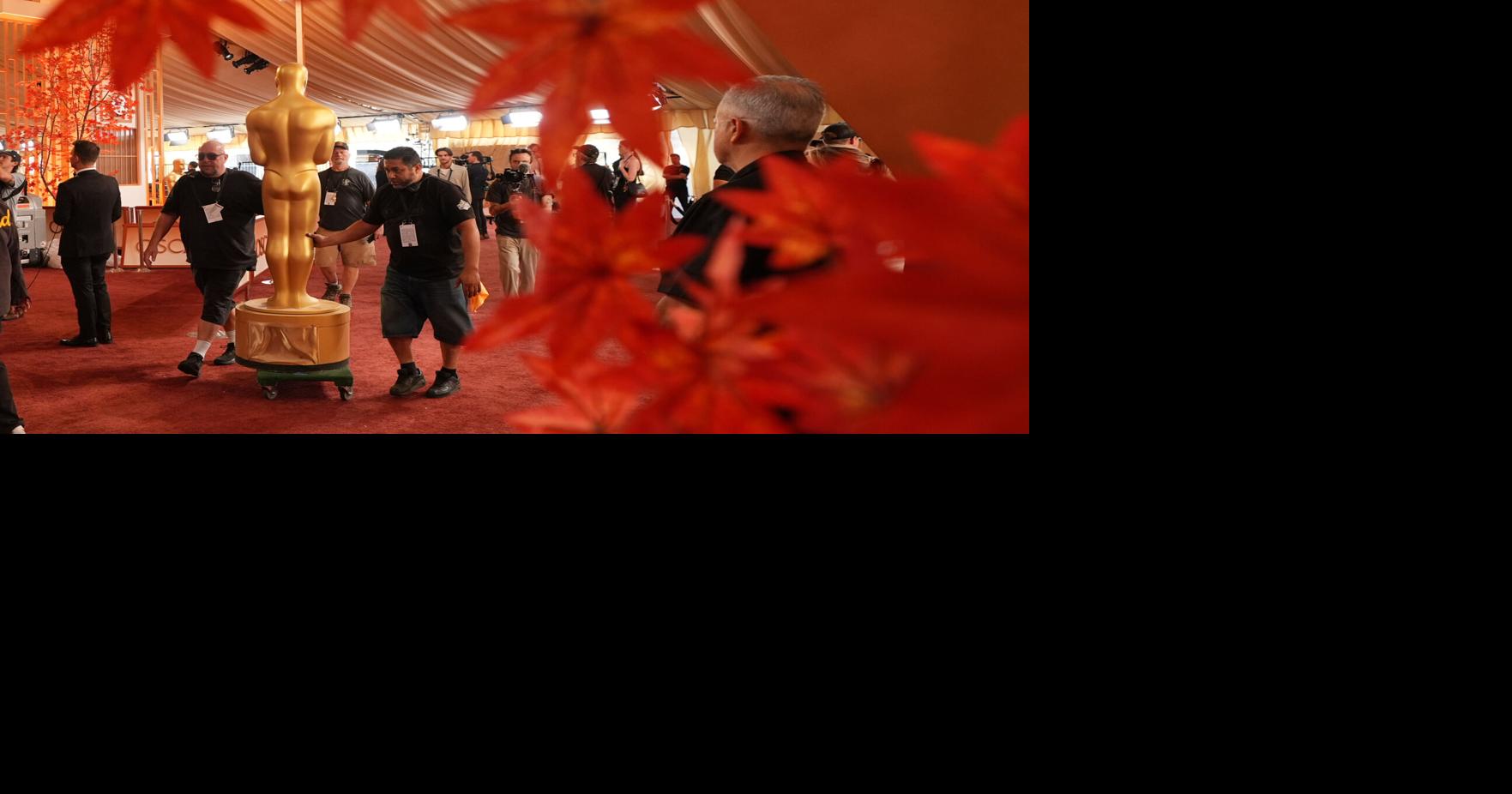 Oscars red carpet sees pops of color as stars arrive