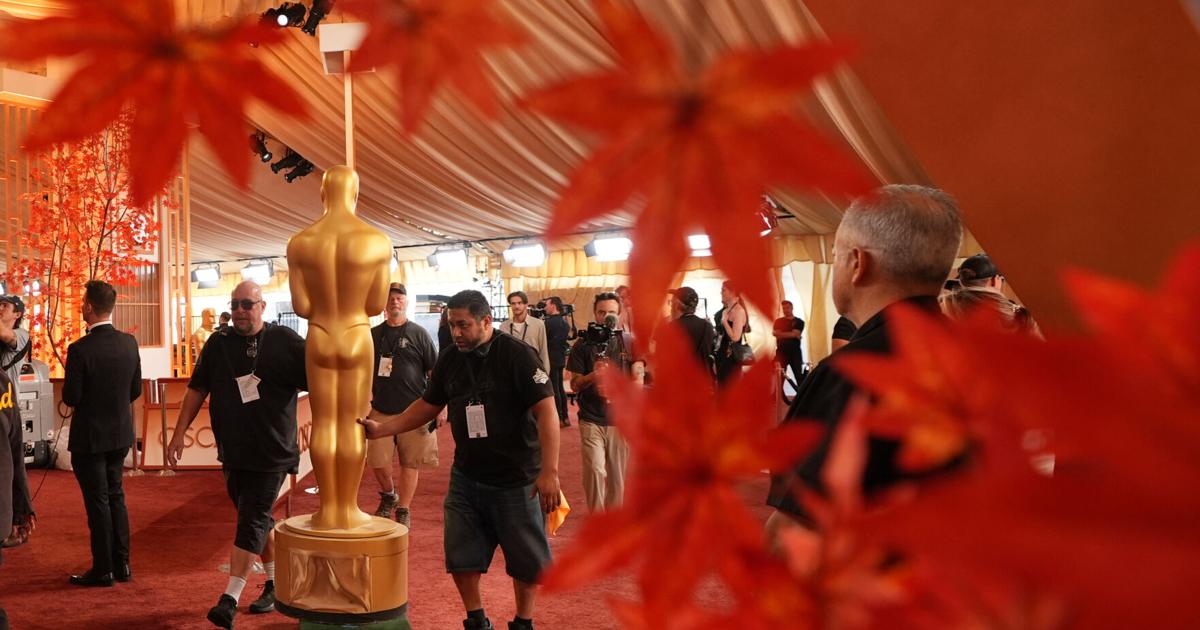 Oscars red carpet sees pops of color as stars arrive