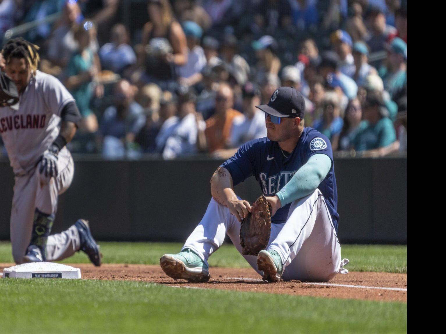 Seattle Mariners' Jake Lamb runs to first base during a baseball