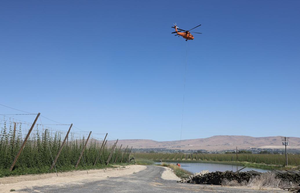 PHOTOS Firefighters battle Thorp Road fire on Rattlesnake Ridge