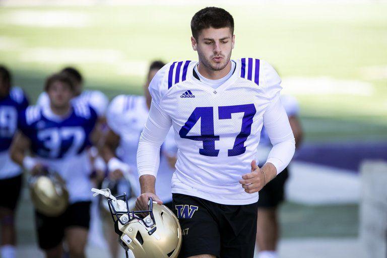 UW football quarterback Haener helped start kicker Peyton Henry's