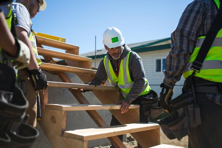 PHOTOS Youth Build students work with Habitat for Humanity News