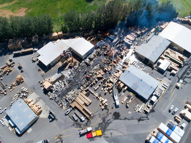 Drone photos show extent of damage to pallet factory News Photos