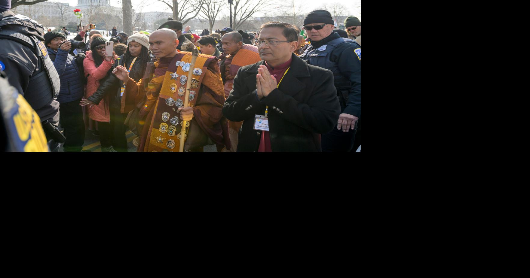 Buddhist monks walk to the US Capitol on the final day of their 15-week journey from Texas