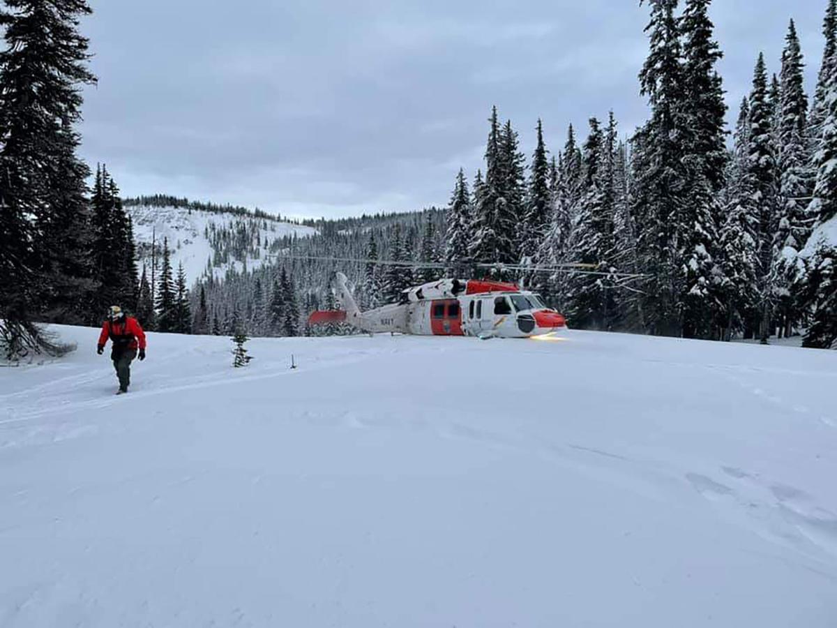 Snowmobiler airlifted off Darland Mountain by Navy helicopter after