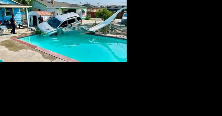 Weird day in Pasco: SUV in swimming pool, garbage truck on fire