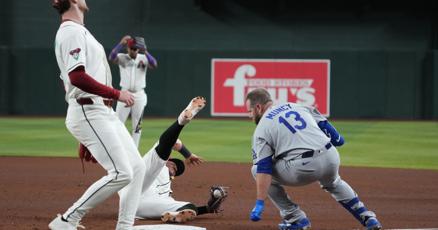 Vargas de Diamondbacks y Muncy de Dodgers, lesionados tras choque violento en 1ra base