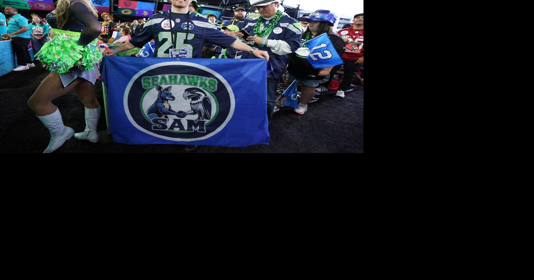 Seahawks trade into fifth round of NFL draft, select guard