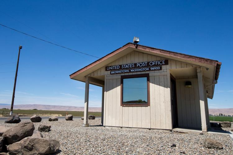 Postmaster of Yakima County’s smallest post office brings cheer to