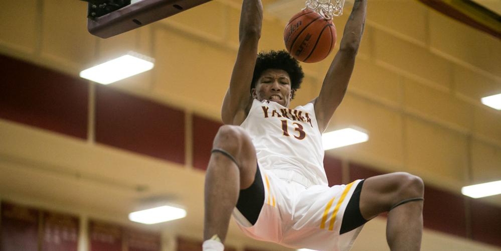 Marjon Beauchamp slams home a monster dunk for Yakima Community College