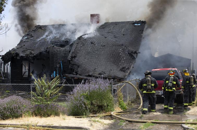 No one injured as house destroyed, two others damaged in Yakima blaze