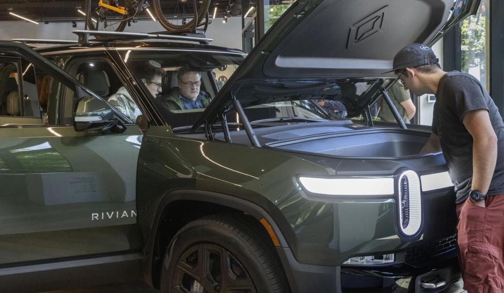 Why does Tesla have dealerships in WA, but other EV makers do not