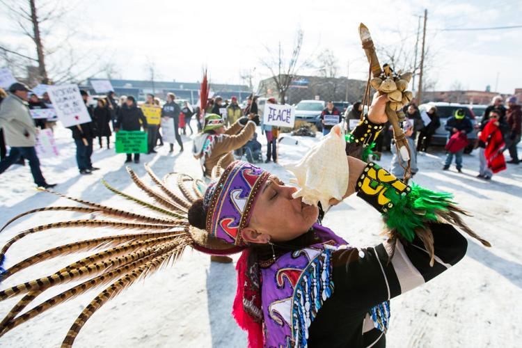 Photos Dozens protest immigration ban during march in downtown Yakima