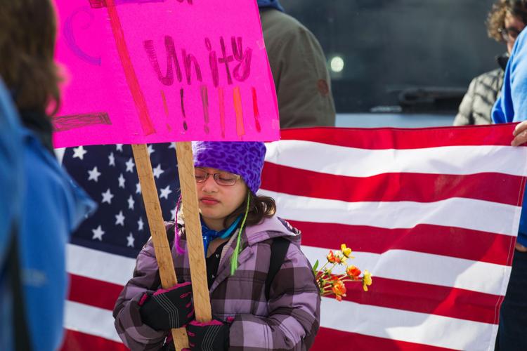 Photos Dozens protest immigration ban during march in downtown Yakima