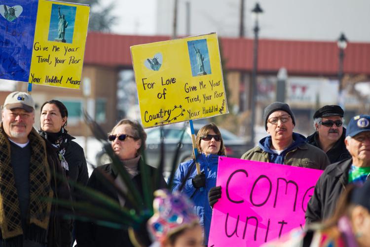 Photos Dozens protest immigration ban during march in downtown Yakima