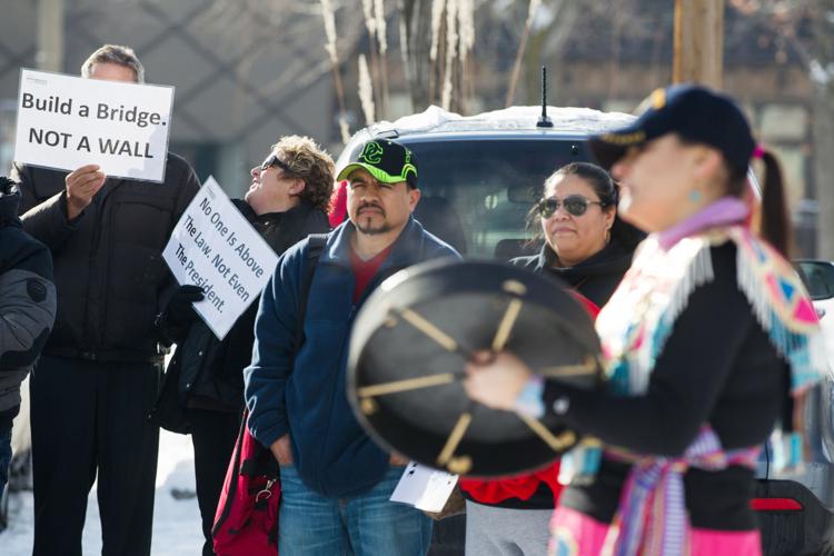 Photos Dozens protest immigration ban during march in downtown Yakima