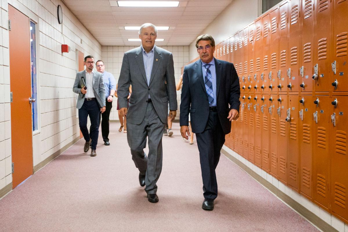 Gov. Inslee tours East Valley High School as funds remain in limbo