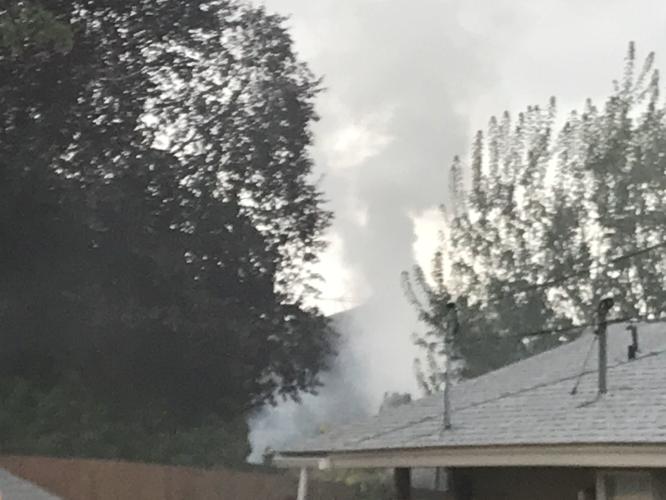 Structure fire in West Valley started in garage, multiple departments
