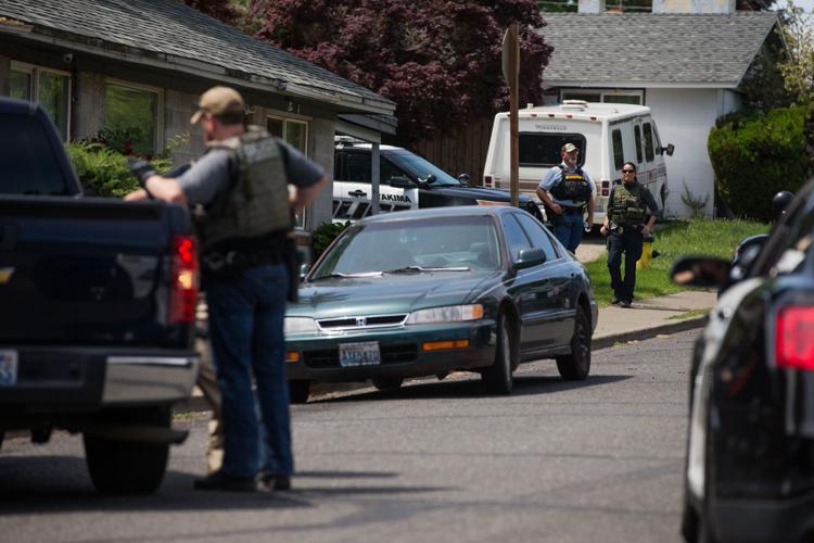 Hourlong standoff ends with suspect's surrender Local