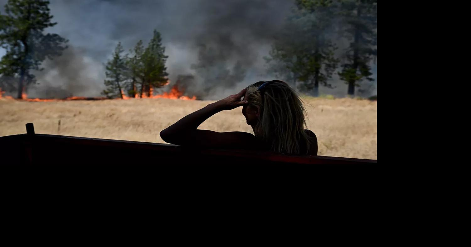 Thousands evacuated in north Spokane as wildfire crosses river into city