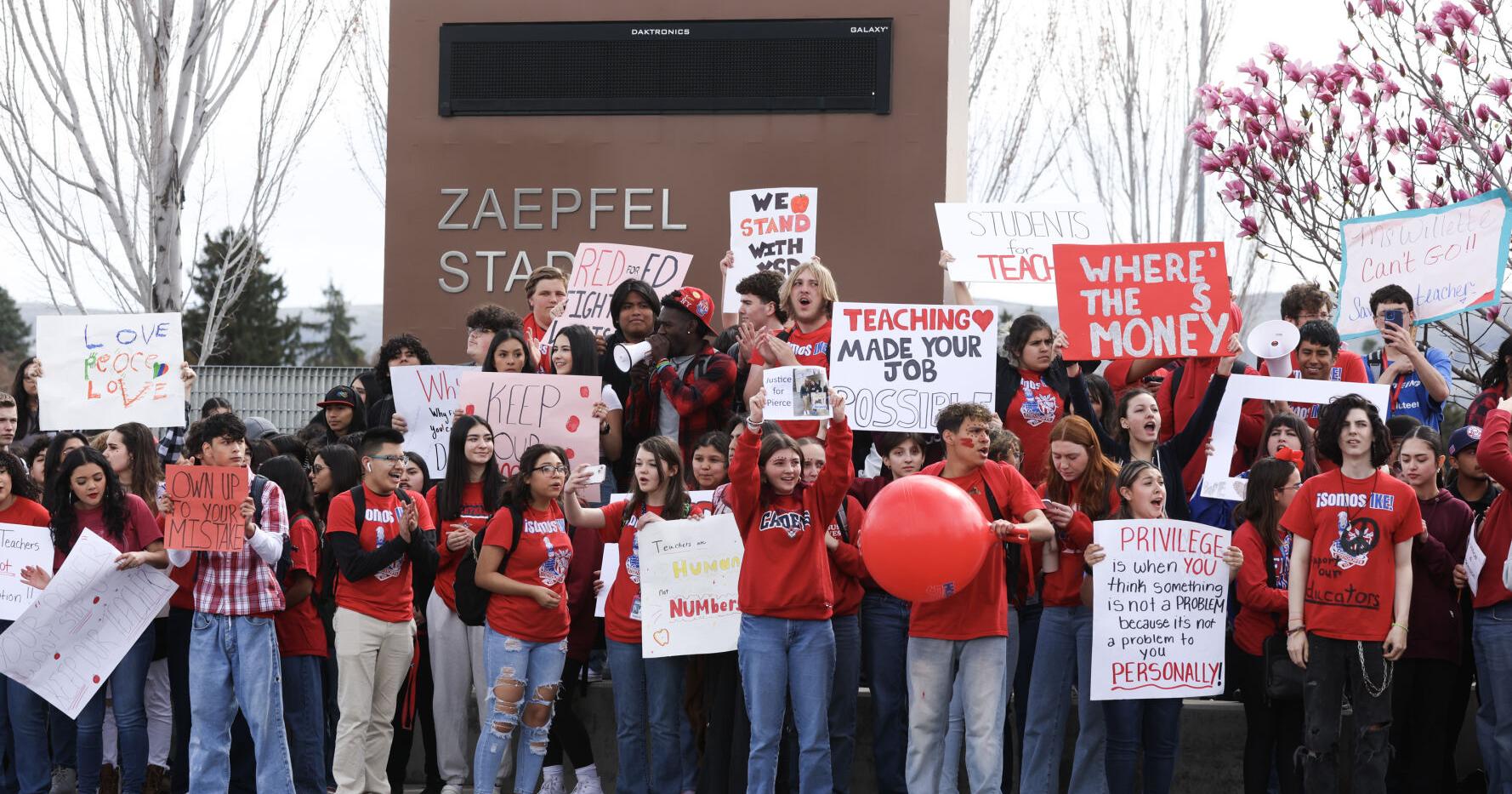Students walk out of Yakima high schools to protest staff cuts - Vimarsana News