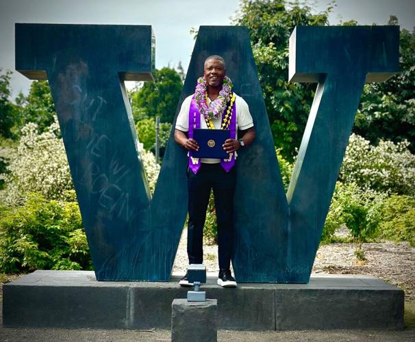 Lawyer Milloy earns UW degree nearly 30 years later, keeps promise to