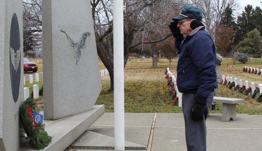 Honoring the fallen Veterans place wreaths on graves at Tahoma