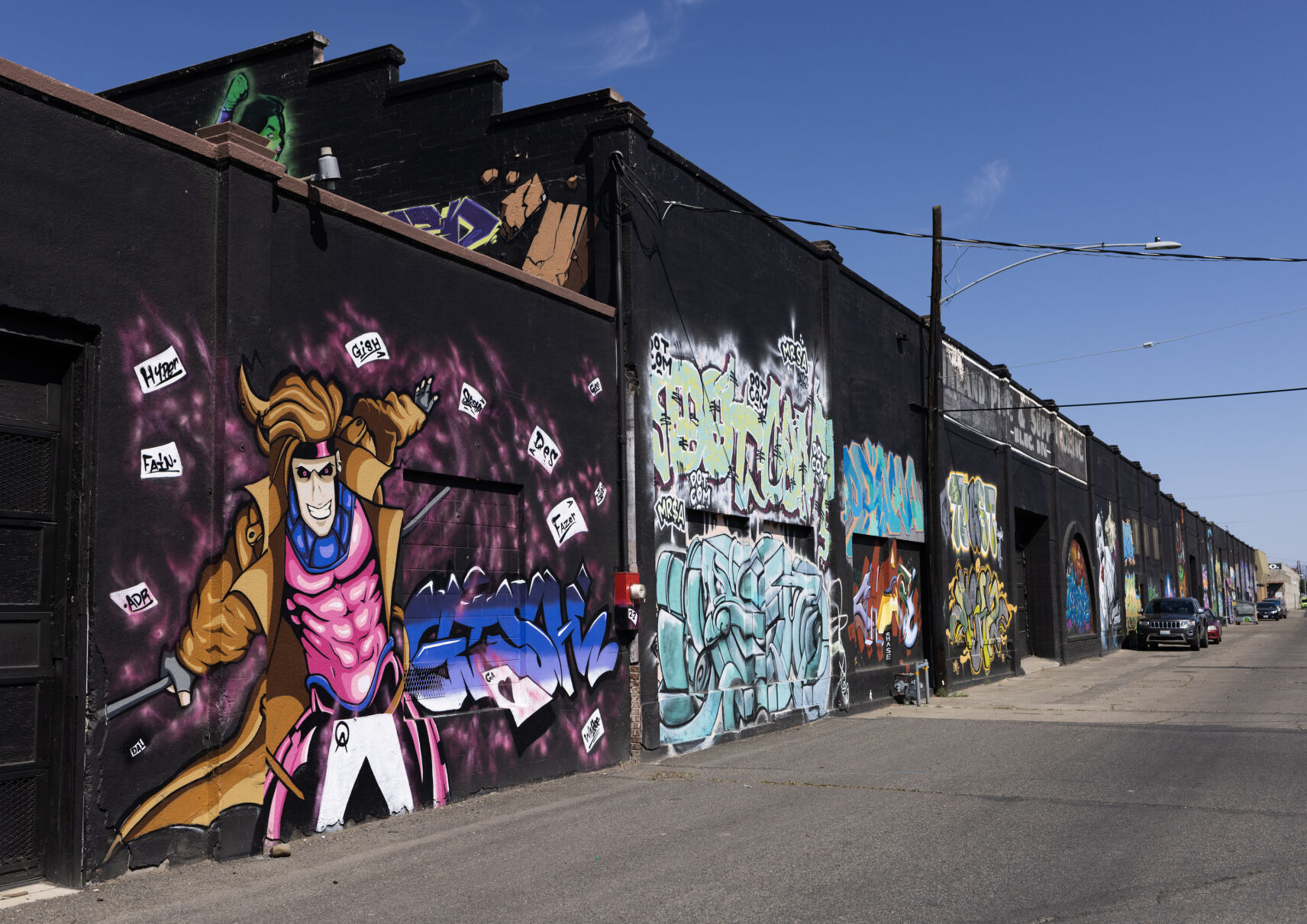 A neighborhood once riddled with gang graffiti finds a